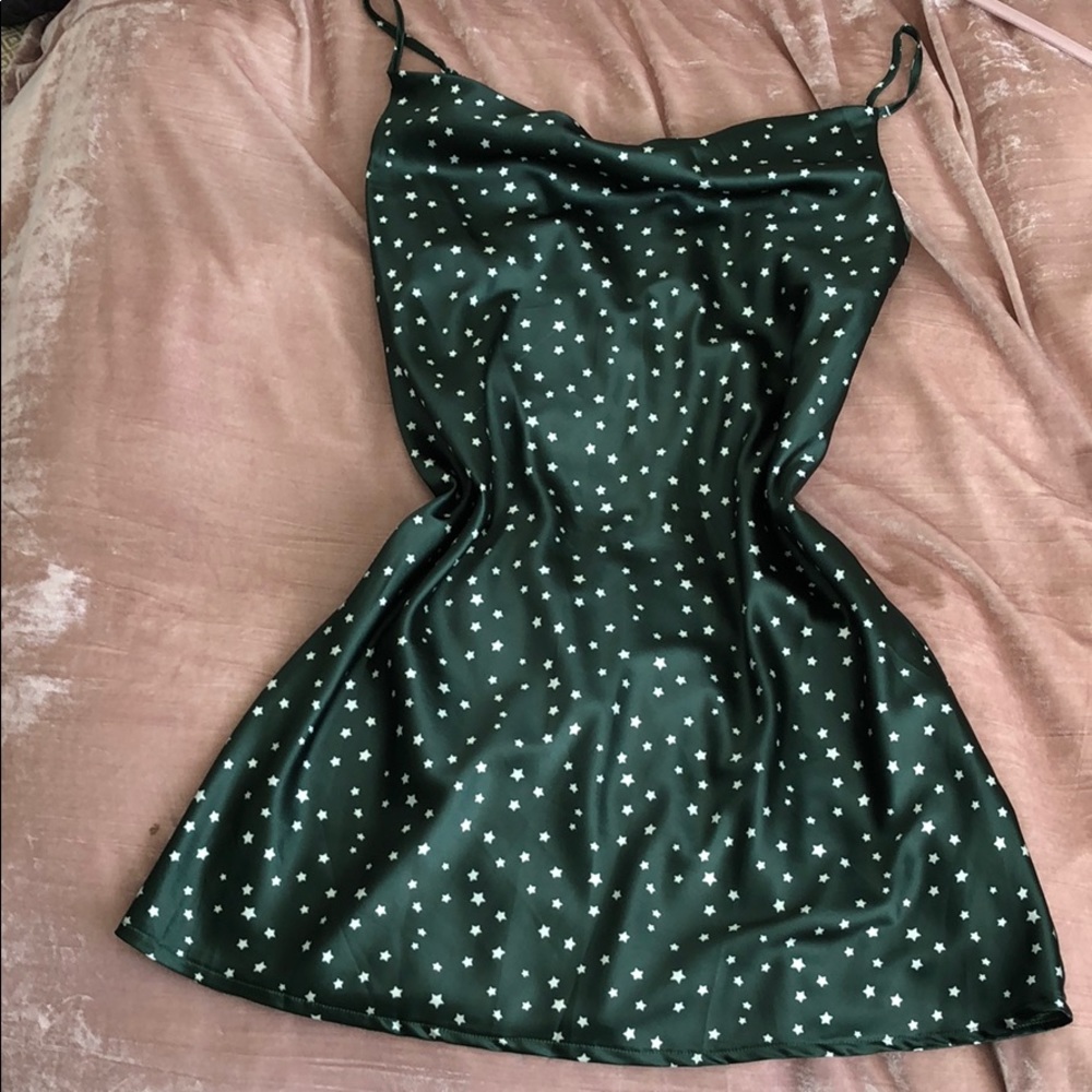 Green mini dress with stars